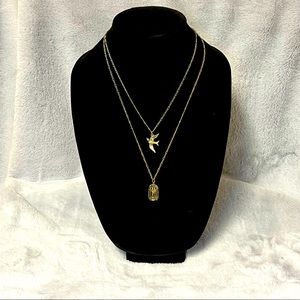 Double necklace with swallow and birdcage